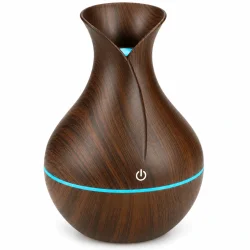 Aroma diffuser i m�rkt tr�look med bl� RGB-lysring og hvidt power-symbol.