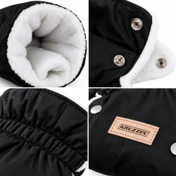 Detaljer af barnevognshandskernes hvide for, trykknapper, elastiske syninger og m�rke.
