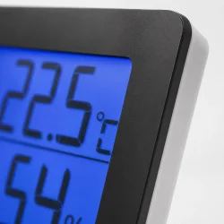 Digitalt termometer med bl�t LCD-display der viser temperatur og luftfugtighed