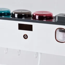 Detaljebillede af elektrisk tandb�rsteholder med UV-sterilisering, tandpastadispenser og moderne design med fokus p� materialer og funktioner
