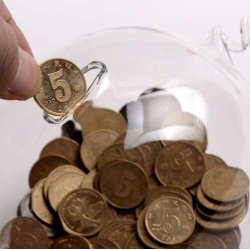 Gennemsigtig sparegris i glas