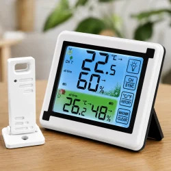 Hygrometer og digital temperaturm�ler med closeup af LCD display og materialedetaljer