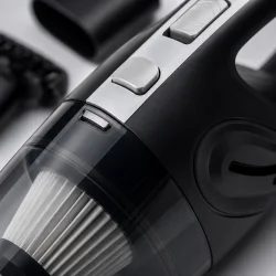 Kraftig h�ndst�vsuger til bil med HEPA filtration og transparent st�vbeholder i close-up