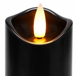 N�rbillede af sort LED stearinlys med varm hvid, flimrende flammeeffekt