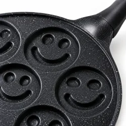 Non-stick pande med keramisk bel�gning og smiley-forme