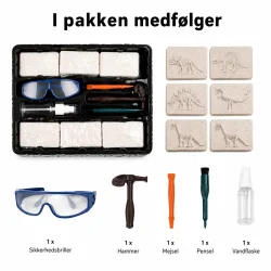 Indhold i dinosaur udgravningss�t med 6 fossilblokke, sikkerhedsbriller, hammer, mejsel, pensel og vandflaske. Komplet eksperiment s�t til dinosaur fossiler og pal�ontologi.