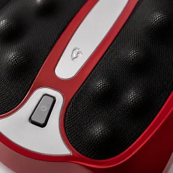 Makro close-up af shiatsu fodmassageapparat med roterende massagepunkter