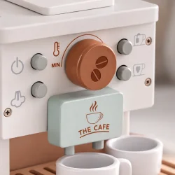 Tr� kaffemaskine leget�j med kopper og kapsler detalje af knapper og drejeknap